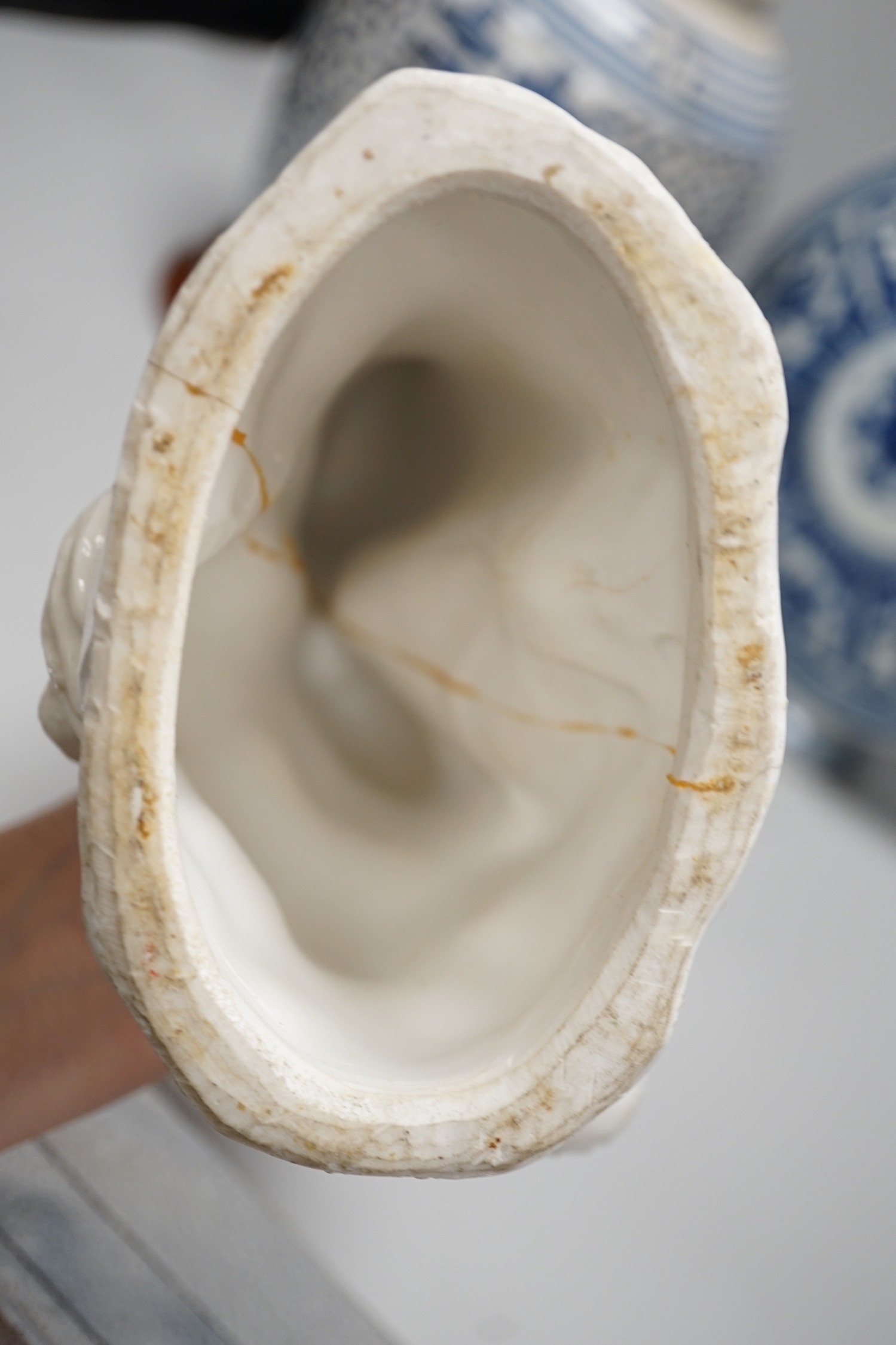 A Chinese blue and white two handled moonflask, together with another Chinese vase and Chinese figure group, tallest 36cm